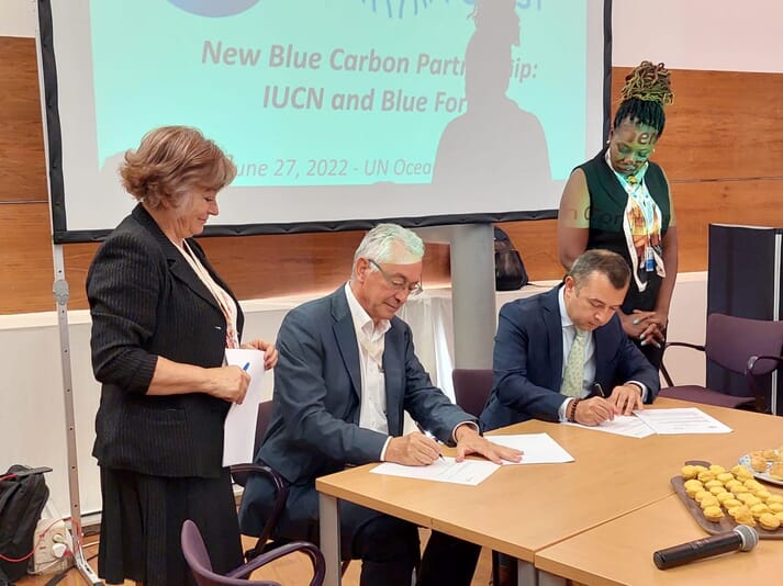 The agreement was signed by IUCN and Blue Forest