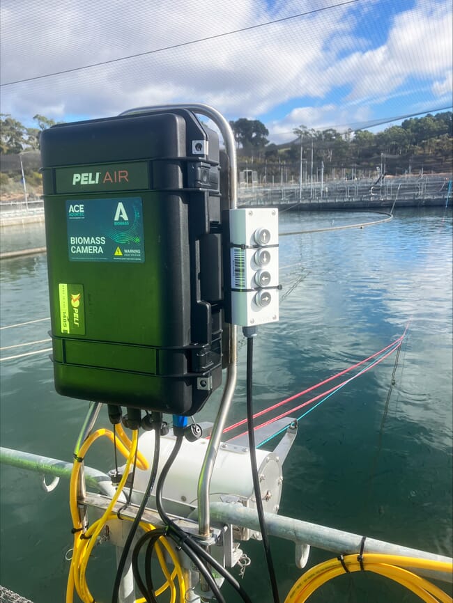 A camera system on the side of a fish pen.