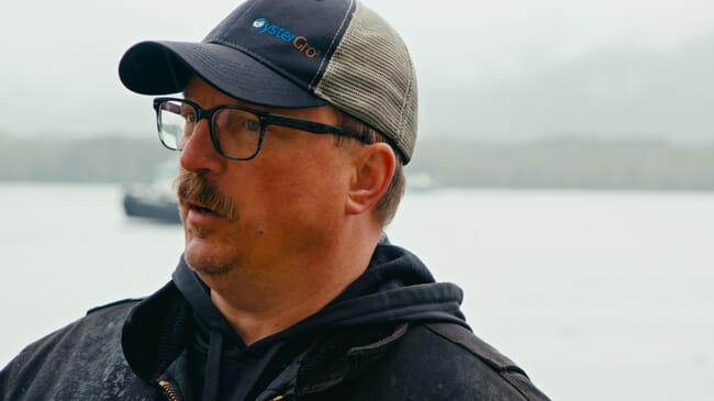 A man in a baseball hat.