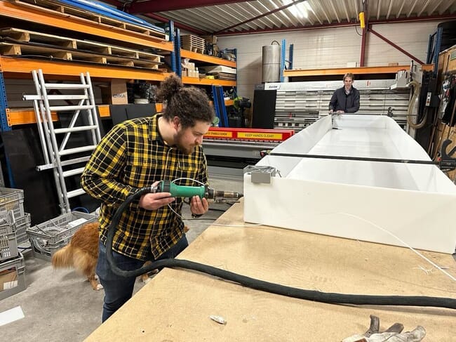 Man constructing biofilter