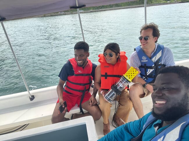 Four people on a boat.