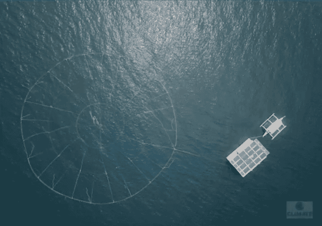 aerial view of a circular rig in the water