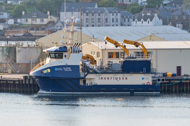 a modern workboat seen from the side