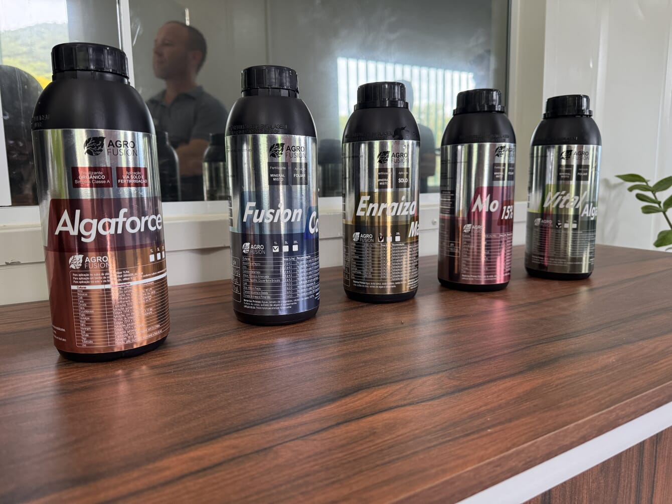 Bottles of seaweed biostimulants placed on a shelf