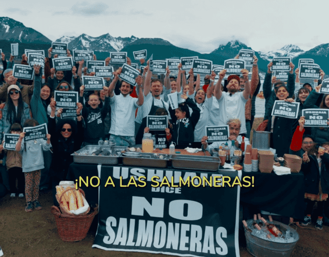 A group of people defending a salmon farming ban in Argentina.