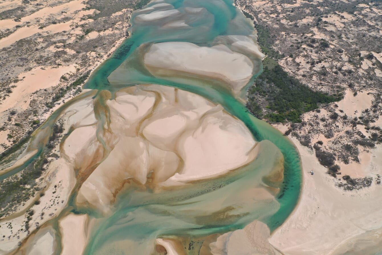 Aerial view of a sandy estuary