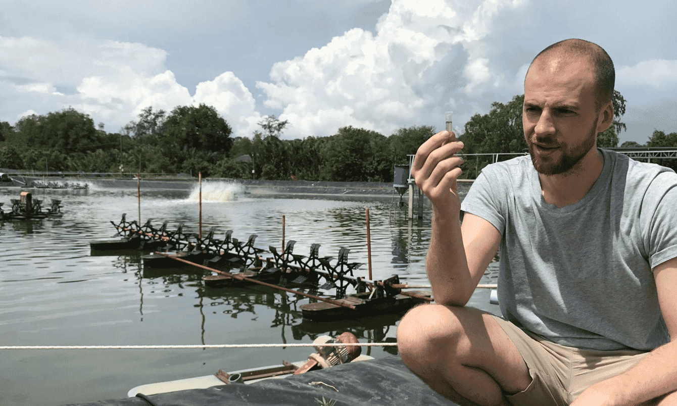 Matthew Pope collecting a sample