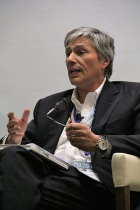 man speaking at a conference