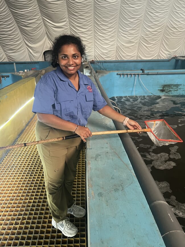 A woman holding a net.