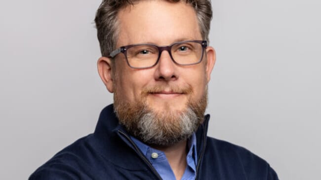 A headshot of a man.