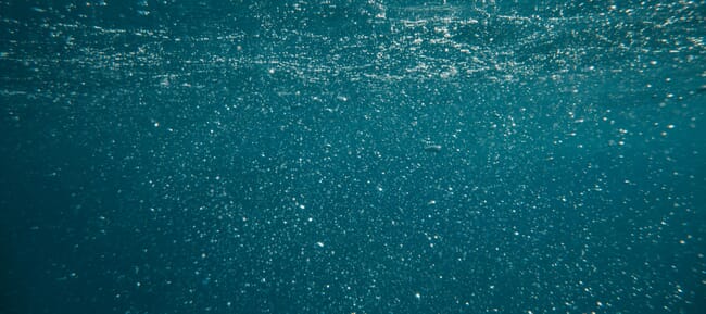 Underwater bubbles in the ocean.
