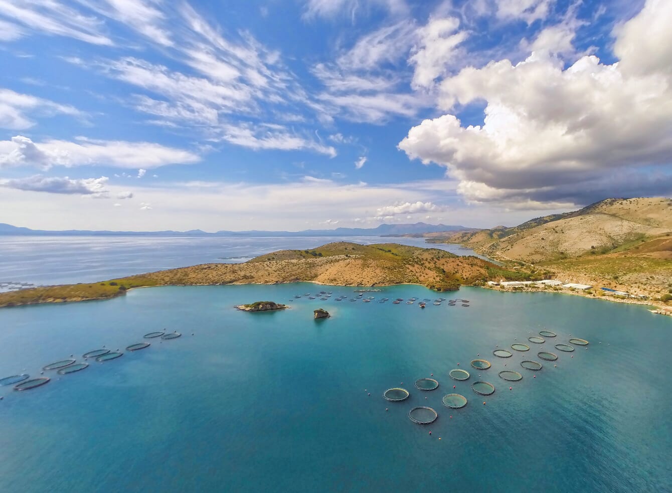 An aerial view of a fish farm in greece.