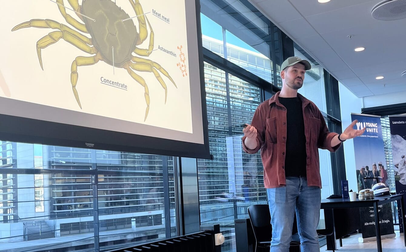 A ceo presenting the work his startup does involving turning invasive crab into aquafeed.