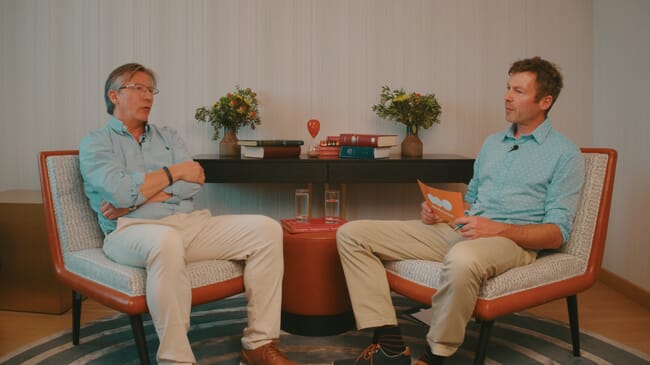 Two men having a discussion.