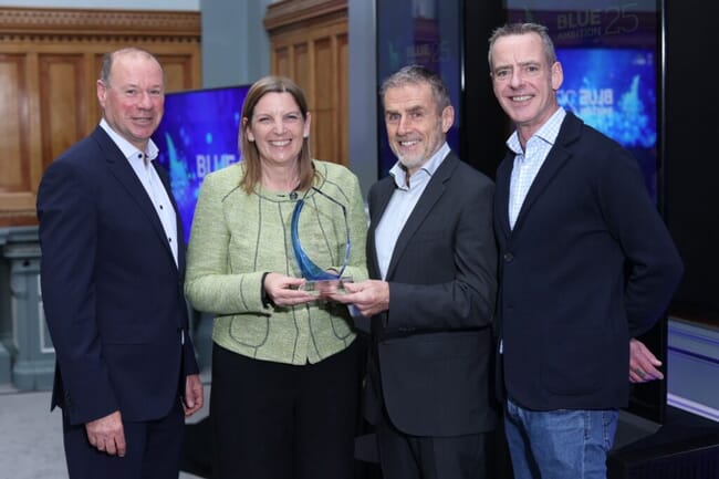 Representatives of an aquaculture technology company accepting an award in Ireland.