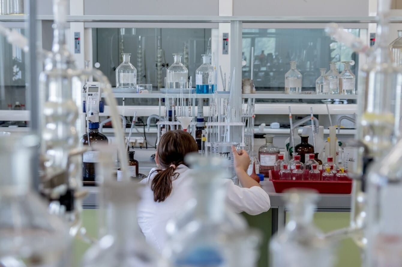 A scientist working in a laboratory on aquaculture product processing.
