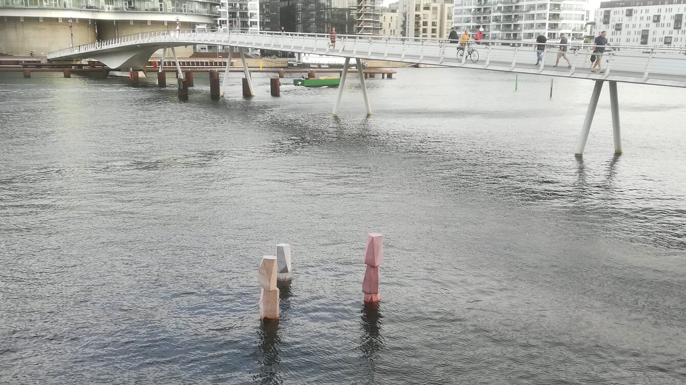 concrete structures sticking out of the water