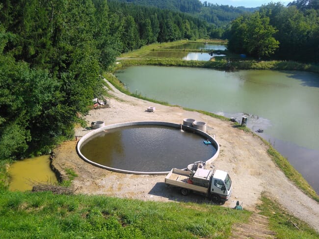 tank-by-pond aquaculture system