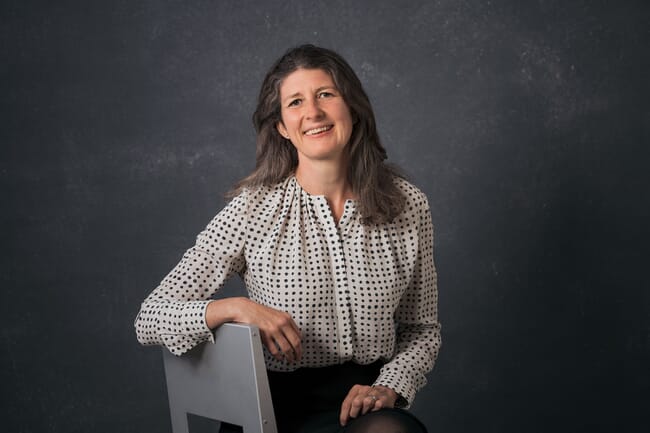 A lady sitting on a chair