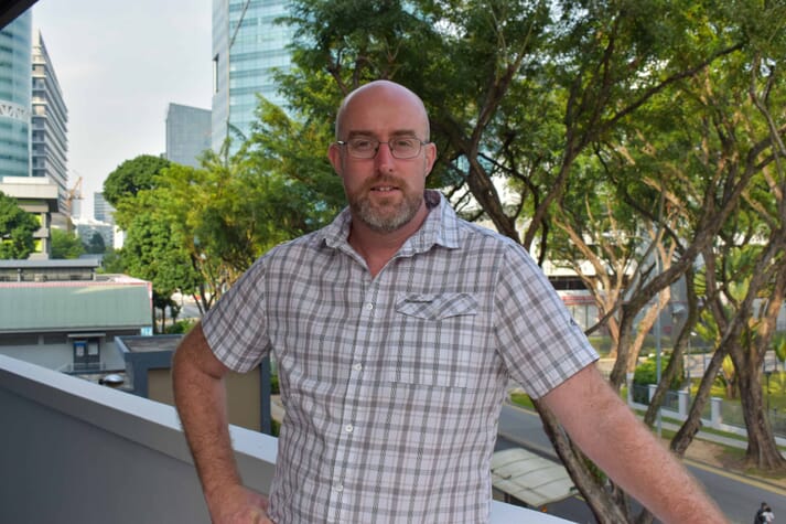 John Fitzgerald outside the Hatch office in Singapore