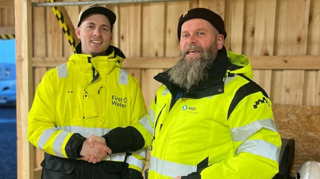 Two men shaking hands.