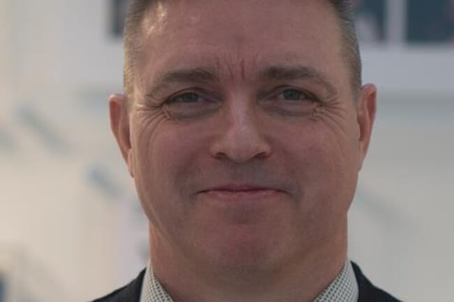 A man smiling at the camera.