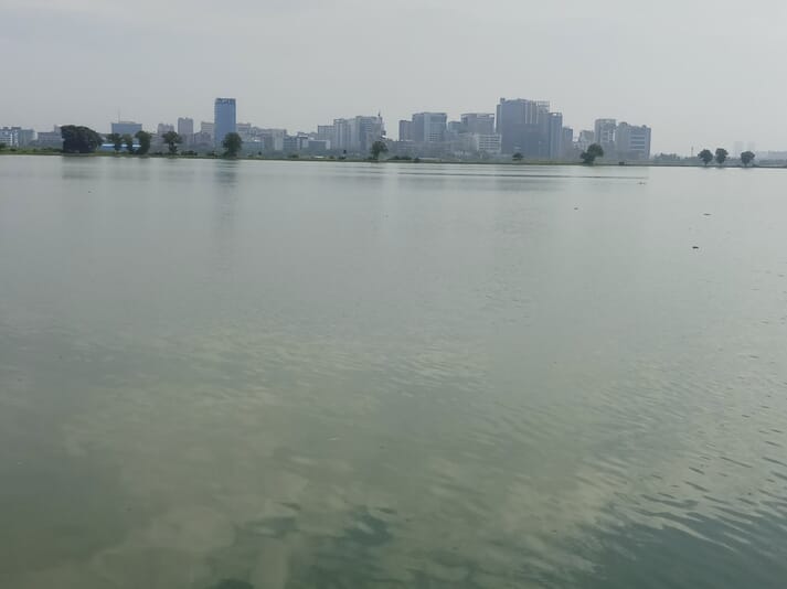 The urban sprawl of Kolkata is encroaching on the wetlands, putting the livelihoods of fishermen and fish farmers like Bijay Mondal at risk