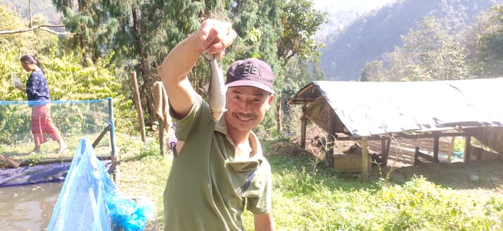 Sarad Rai holding a fish