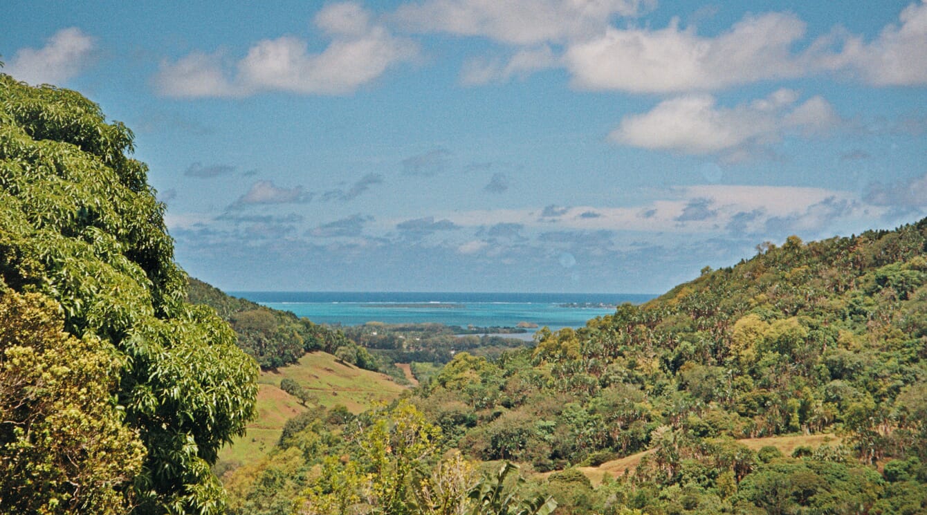 A view of a turquoise lagoon from the mountains in Mauritius.