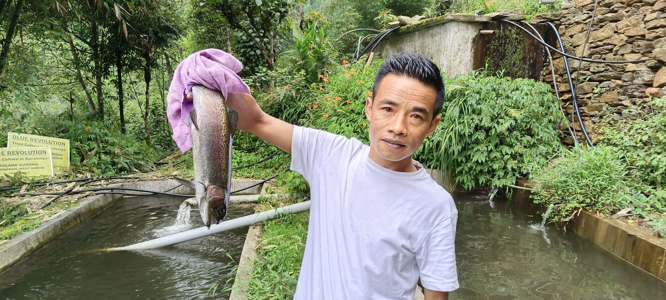 Man holding a rainbow trout