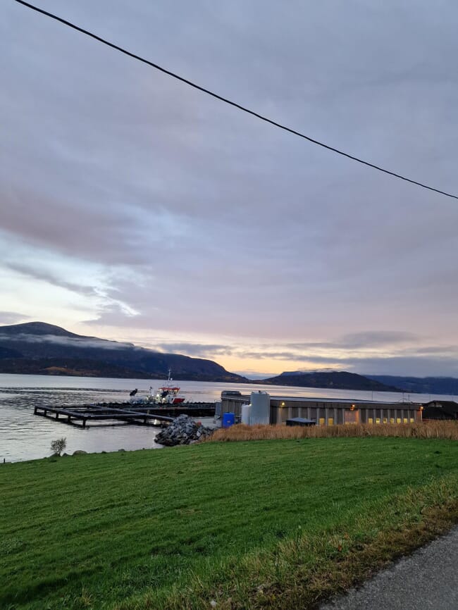 A building beside a fjord.