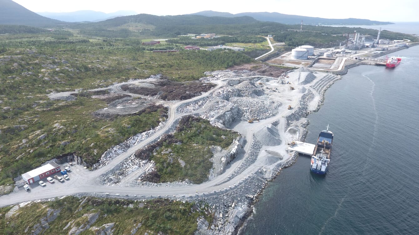 An aerial view of a land-based Atlantic salmon farm in construction by the Norwegian fjords.