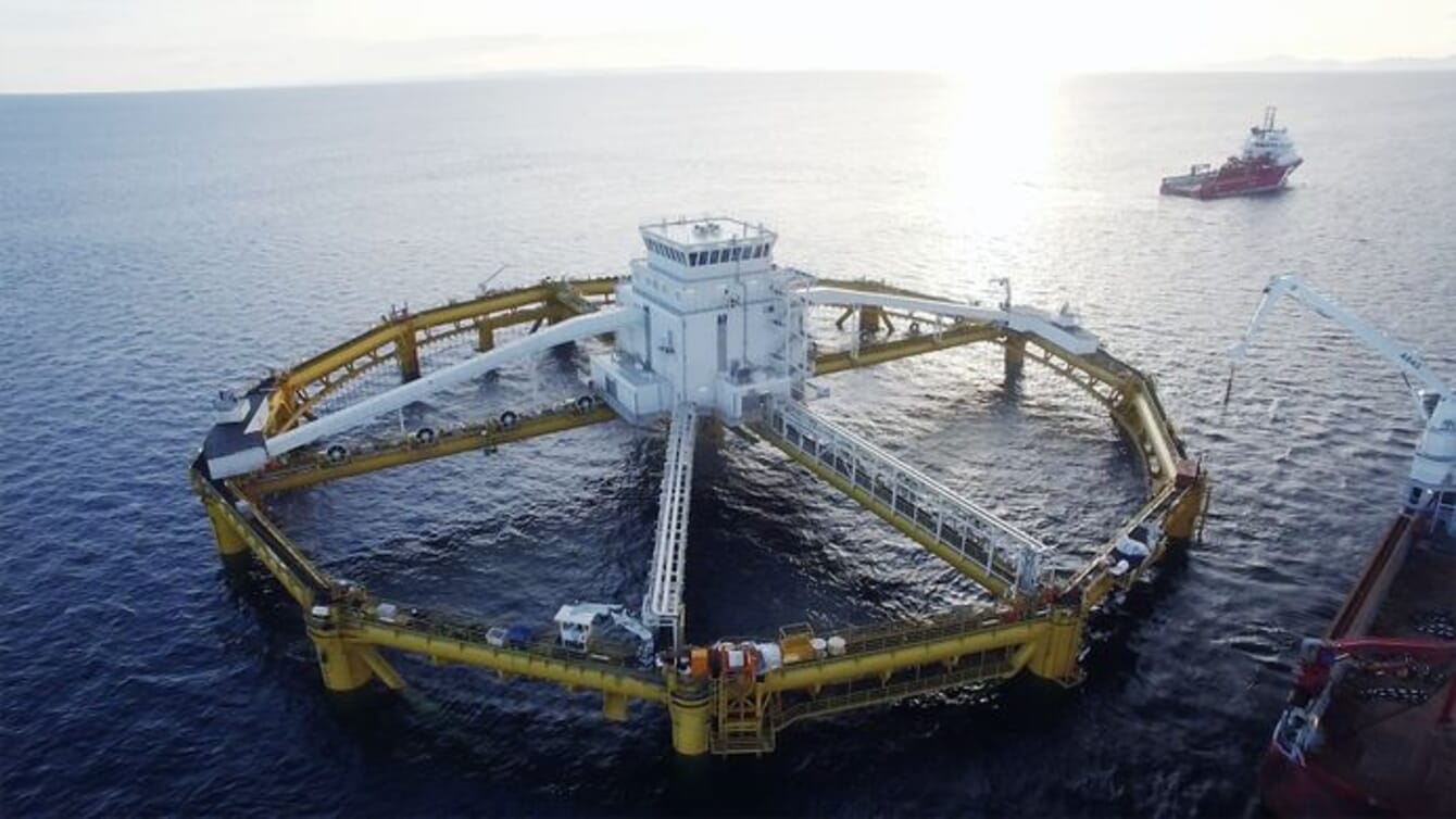 Aerial view of a giant metal fish farm.