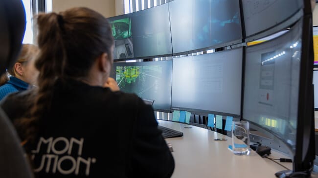 person sitting at a computer