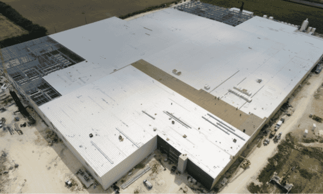 aerial view of a building that houses an indoor salmon farm