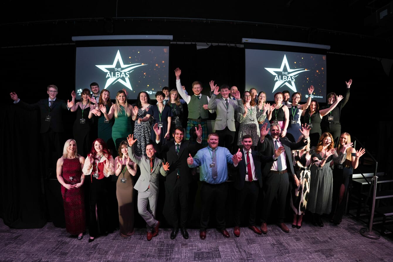 A group of aquaculture talents celebrating their award at a ceremony.