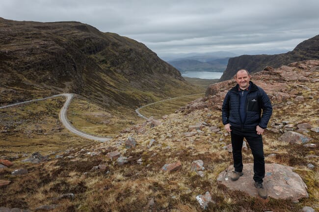 Ian Laister poses at the top of a glen.