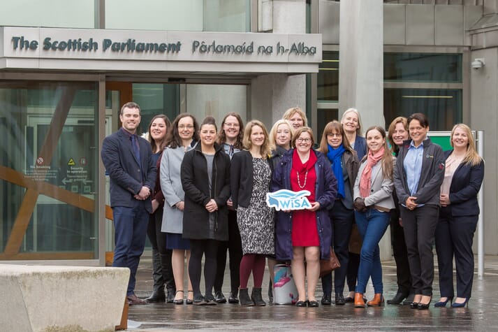 Members of WiSA gathered outside the Scottish Parliament when the initiative was launched