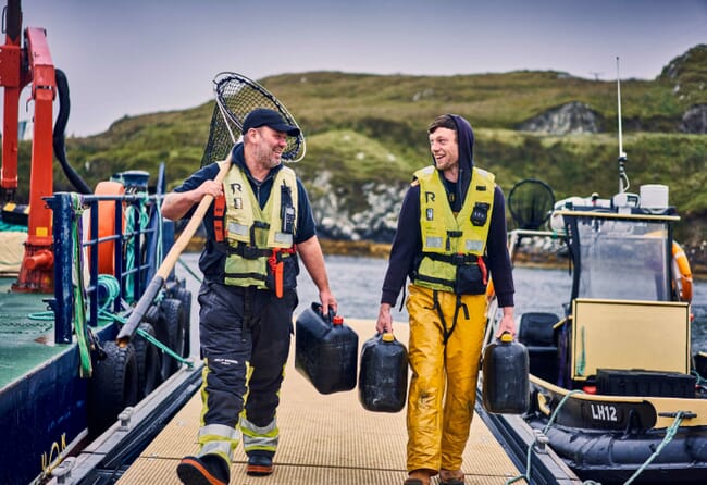 two men at a fish farm