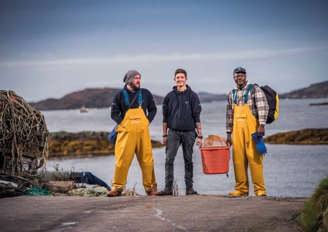 aquaculture technicians standing on the shore
