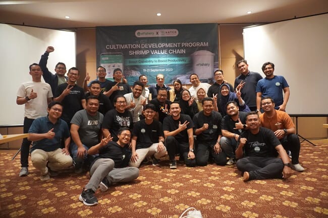 A group of people at a shrimp farming workshop