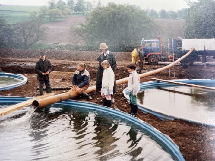First salmon parr arriving at the only-just completed Fossoway farm, in 1988