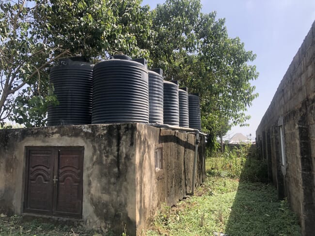 Water tanks on the roof of a building.