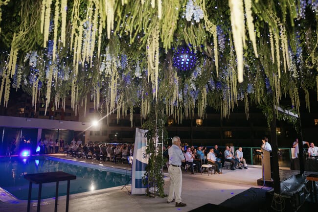 a man addressing a conference