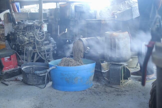 A machine in a small-scale feed factory.