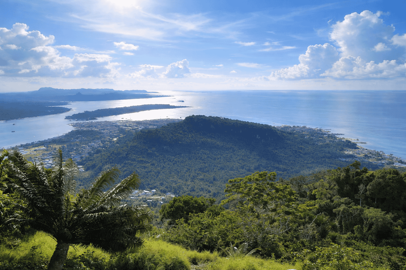A green island in the Philippines on a sunny day.
