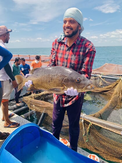 Man holding a large fish