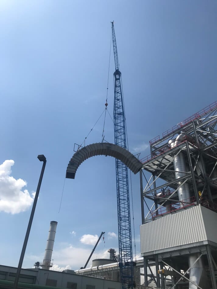 A crane lifts the top ring of one of the protein dryers being built at the Flint Hills Resources Fairmont ethanol plant. The plant is installing the Maximized Stillage Co-Products™ or MSC technology which converts a portion of the distillers grains produced at the site into a high protein animal and fish feed ingredient