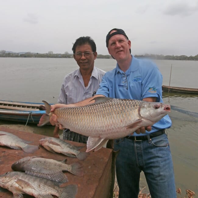 Man holding large carp