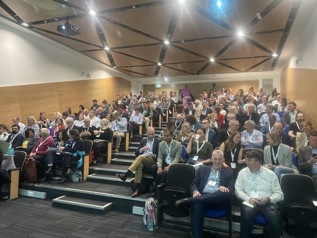 Group of people sitting in a conference